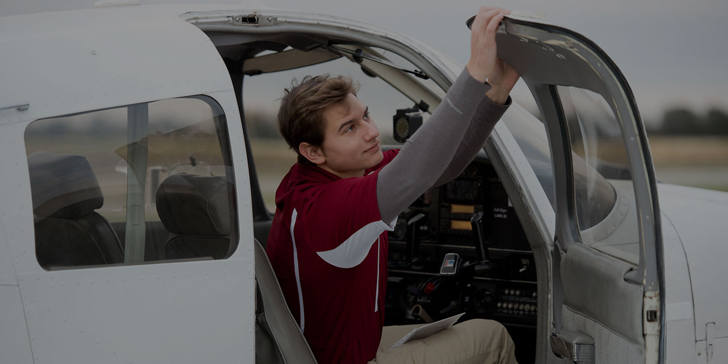 Student going through pre-flight checks