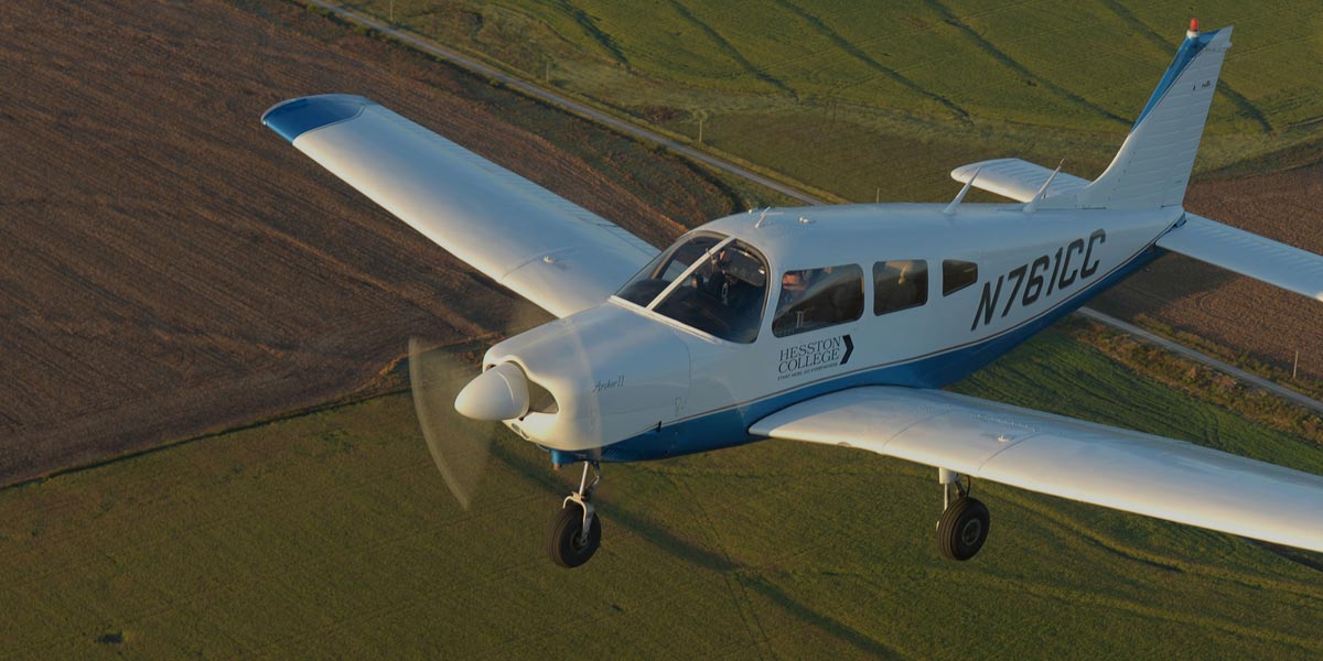 Archer training plane in mid-flight