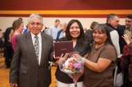 Celeste Begaye ’10, center, with her parents Danny ’94 and Lillian ’95 Begaye.