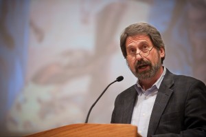 John Sharp speaks at a Hesston College "Common Threads" program