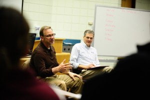 David Myers (left) and Kevin King talk with the Hesston College Disaster Management Leadership class about traits of an effective leader.