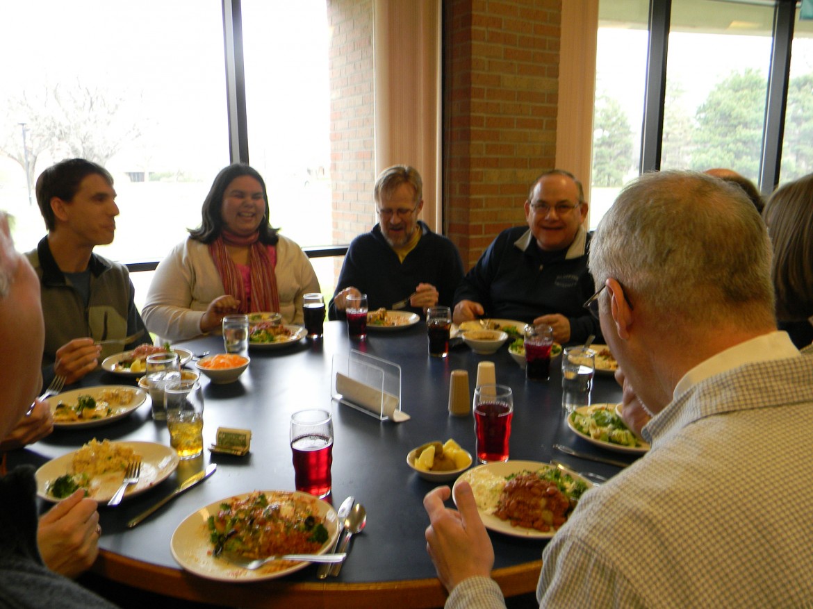 Campus pastors Todd Lehman (Hesston College), Joanne Gallardo (Eastern Mennonite University), Ed Janzen (Conrad Grebel University College) and Stephen “Tig” Intagliata (Bluffton University) enjoy conversation over lunch on the Hesston College campus March 29.