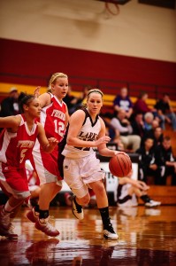 Mishaun Pfannenstiel drives to the bucket verses Friends University JV