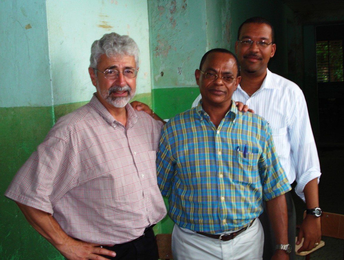 Glenn Smucker meets with Paulino Rosario Guerrero, mayor of Pedro Santana, Dominican Republic, and Cesareo Guillermo of Pan American Development Foundation on one of his short-term consulting trip.