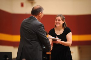 09comm_annali_5204 Annali Murray receives her diploma from Hesston College President Howard Keim.