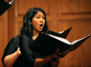 Shawnti Peachey, a member of Hesston's Bel Canto Singers, sings during opening worship.