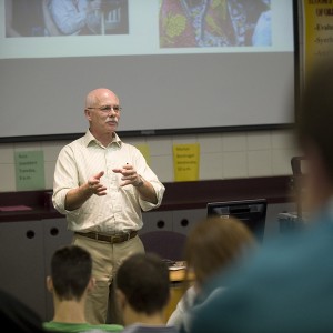 Ten Thousand Villages Public Relations Director Doug Dirks speaks to Hesston College students in David LeVan's Exploring Business class.