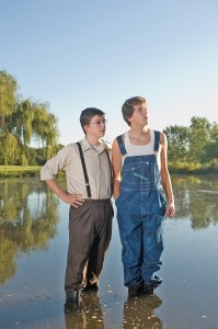 C.C. Showers, played by Mitch Stutzman (left), sophomore, Middlebury, Ind., befriends the simple-minded boy, Buddy Layman, played by Matt Lehman, freshman, Kidron, Ohio.