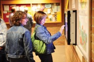 Alumni access class photos through the History Center kiosk.