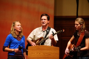 main-09chw_chapel_2877 Hope Weaver, Herm Weaver and sophomore Chloe Weaver sing and share during Friday morning’s Centennial Homecoming Chapel.