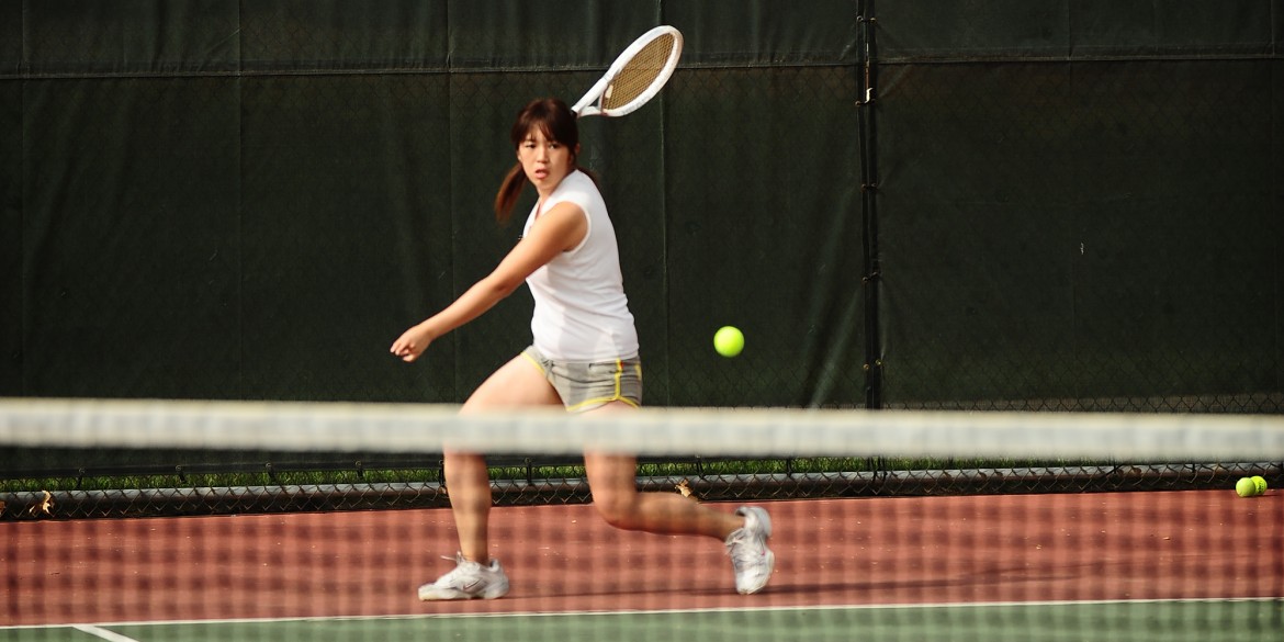 Hesston College women's tennis action photo