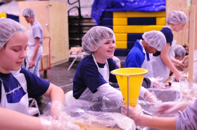 Numana volunteers package meals during a meal packaging event. Photo courtesy of Numana.