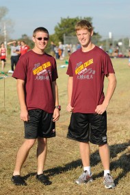 Freshman Jacob Landis (left) and sophomore Kenny Graber (right) are following in their fathers’ footsteps as runners at Hesston.