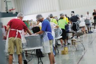 Volunteers package meals during the collegesponsored food-packaging event with Numana. Photo by Curtis Denlinger