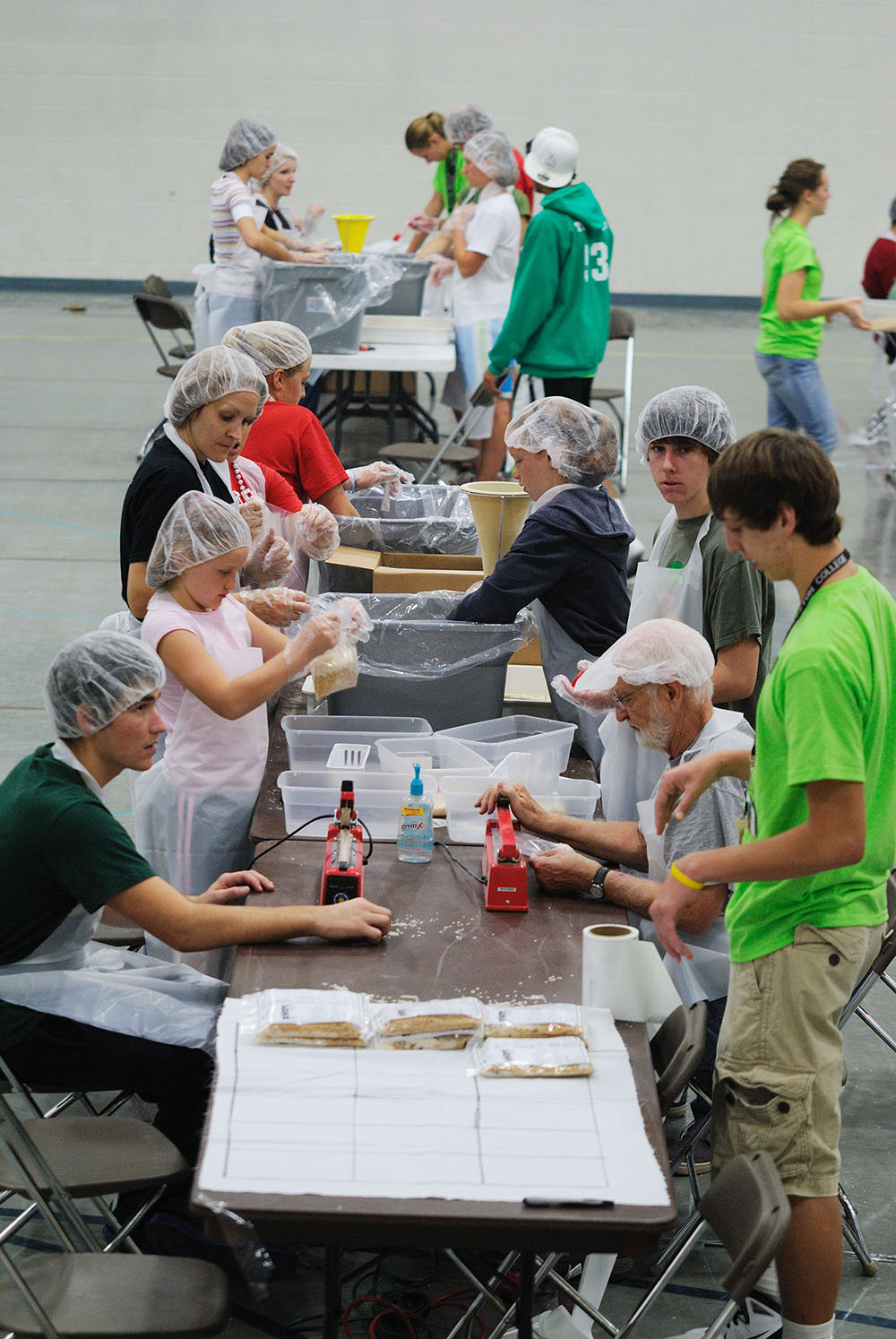 Hesston College students, faculty, staff and local community members came together to package more than 50,000 meals during Numana’s food-packaging event Oct. 1.