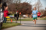 Sophomore Krista Rittenhouse (Mount Pleasant, Pa.), crosses the finish line during the 20th annual Howard Hustle Two-Mile Run Walk. Rittenhouse, who is a member of the cross country team, was the top female finisher with a time of 13:08.