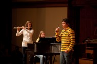 Freshman Broxton Busenitz (North Newton, Kan.), performs a song during the Talent Show accompanied by sophomores Erin Hershey (Mechanicsburg, Pa.), and Katie Miller (Rio Rancho, N.M.).