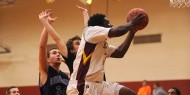 Hesston College men's basketball action photo