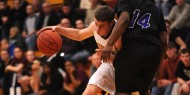 Hesston College men's basketball action photo