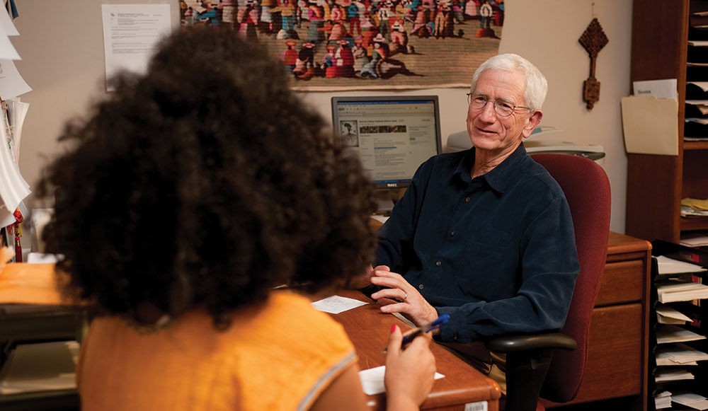 Dave Osborne meets with Zenawit Nerae, a sophomore from Addis Ababa, Ethiopia.