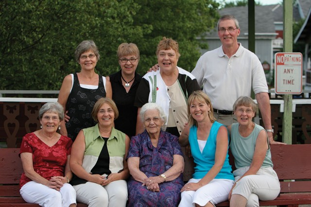 KauffmanFamily Back row from left: Marilyn (Kauffman) Ac55, ’57 Miller; Bonnie (Kauffman) Ac65, ’67 Sowers; Joy (Kauffman) Ac57 Sears; “Junior” Kauffman Ac63, ’69 Front row from left: Betty (Hostetler) Ac53, ’55 (Kauffman) Schmidt, Charles’ wife; Gloria (Kauffman) Ac61, ’63 Yoder; Clara Kauffman; Phyllis (Kauffman) ’74 Hysong; Evelyn (Kauffman) Ac59, ’61 Schellenberger. Courtesy photo taken shortly before Clara’s death in 2006.