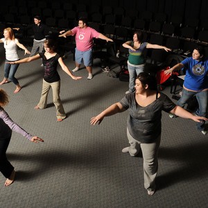 Hesston College Music Theatre Workshop students work with Danika Bielik (front), dance instructor at Bethel College Academy of Performing Arts (Newton, Kan.) on choreography for their upcoming performance.
