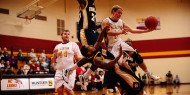Hesston College men's basketball action photo - Pierre Zook
