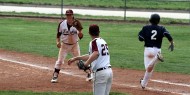 Baseball action photo by Nita and Mike Hart