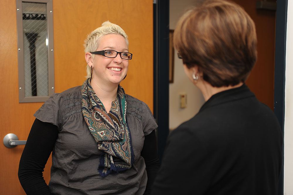 Rachel Neufeld, 2001 Hesston College graduate, talks with Hesston’s Director of Nursing Bonnie Sowers.