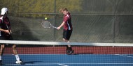 Hesston College men's tennis action photo