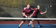 Hesston College men's tennis action photo