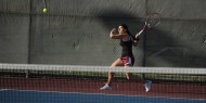 Hesston College women's tennis action photo