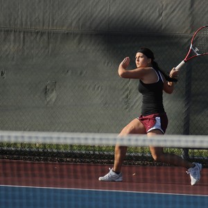 Hesston College women's tennis action photo