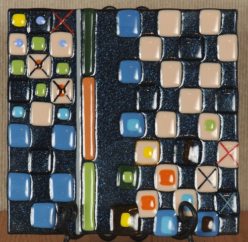An untitled fused glass piece by sophomore Erika Fujimoto was named Best in Show in the Hesston College student art show.