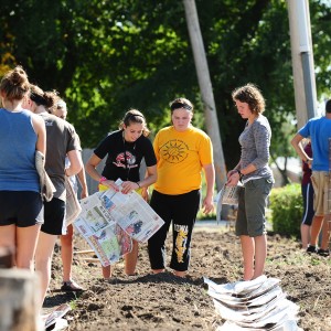 Students prepare the Hesston Community Garden for spring planting during No Impact Week Sept. 25 to Oct. 2.