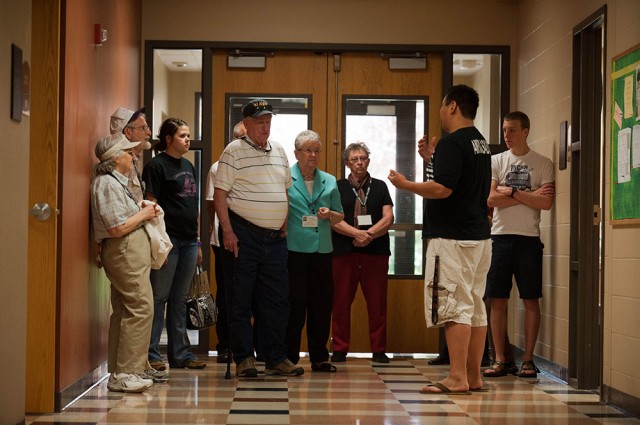 Hesston College sophomore Andrew Penner (Fresno, Calif.) gives a campus tour to a group of grandparents on campus for the college’s annual Grandparent Days March 29 to 30.