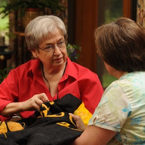 Martha Hershberger and Faith Penner, a mother-daughter team, work on the Hesston College Centennial Quilt. The quilt will be unveiled following a Friday evening, Sept. 25 performance of Quilters.
