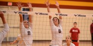 Freshmen Maggie Lasater (11) and Lacey Crenshaw (6) defend against Allen Community College