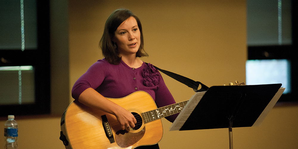 Beth demonstrates elements of music therapy during her presentation at the Homecoming Weekend Performing Arts Showcase.