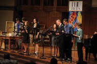 Students, faculty and staff perform during the original radio show The Fragrant and Velvety Air, written by performing arts faculty members Bradley Kauffman and Laura Kraybill.