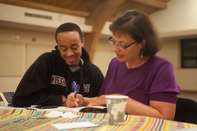 Sonia Nazario, author of "Enrique's Journey" signs a copy of the book for Hesston College freshman Christian Stevens of South Bend, Ind.