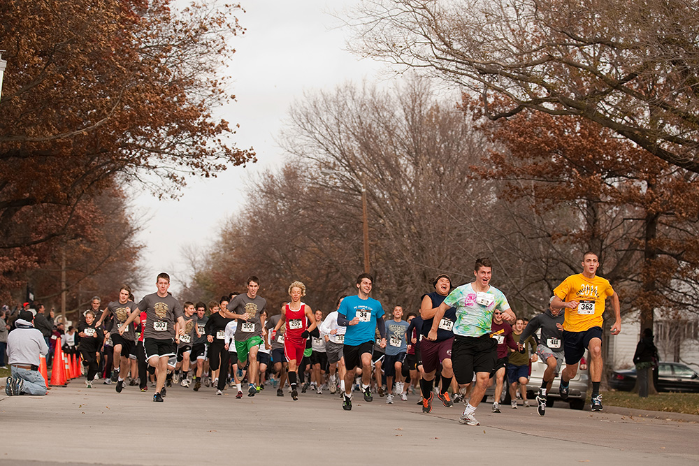 Participants in the 2011 Howard Hustle Two-Mile Run/Walk start the race during the Thanksgiving Weekend tradition at Hesston College.