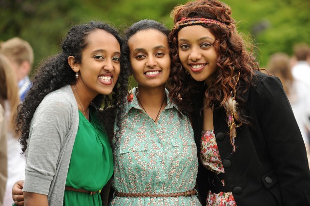Graduates Asbel Assefa (Addis Ababa, Ethiopia), Herane Girma (Alexandria, Va.) and Zenawit Nerae (Addis Ababa, Ethiopia) celebrate their new degrees following commencement.