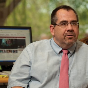 Kevin Wilder visits with a student