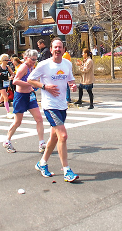 Hesston College alumnus Lynn Fielitz runs the Boston Marathon.