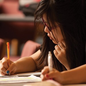 Crisentia Gregor ’14 (Banyuwangi, Indonesia) takes notes during class.