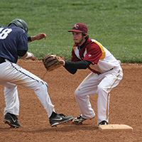 Nick Yoder ’14 (Millersburg, Ohio) tags a Brown Mackie (Salina, Kan. runner out.