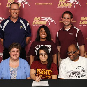 Brett Fair signs to play tennis for Hesston College.