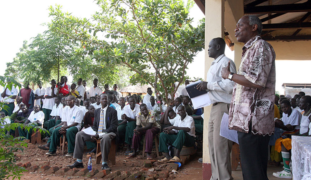 Tony Brown speaks at the Anthony Brown Baritone School in Uganda.