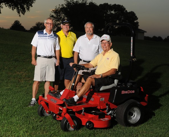 Harold Winsinger of Hesston, Kan., won the Big Dog mower given by Excel Industries at the first Hesston College Student Scholarship Golf Tournament sponsored by Excel. Winsinger returned the mower and it was put up for auction and purchased by Norm Yoder of Henderson, Neb. Pictured from left are Bob Mullet, vice president of Excel; Paul Mullet, president and CEO of Excel; Yoder and Winsinger. The new event hosted 68 golfers and proceeds benefited the Jim Boyts Scholarship.